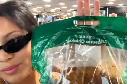 Chloe Gray stunned fellow flyers by bringing a rotisserie chicken on board as hand luggage, calling it her “designer bag” and a savvy, healthy alternative to plane food.