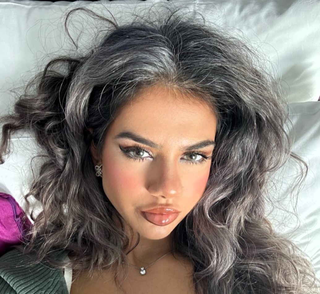 Zara Younas went viral after embracing her grey hair at 24 - first spotted at age 13, she now flaunts her silver locks with pride despite online hate and praise alike.
