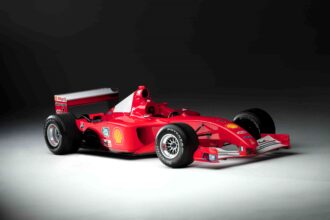 Michael Schumacher’s 2001 Monaco-winning Ferrari F1 car sold for £13.4M, setting records as his most expensive and historic race car ever auctioned.
