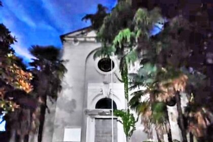 An urban explorer uncovered an abandoned Italian chapel with stained glass, religious art, and a hidden morgue beneath it, complete with a body table and freezers.