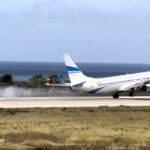 Passengers scream as Enter Air jet bounces on Rhodes runway during hard landing in 45kph crosswinds - pilot praised for avoiding disaster in viral video.