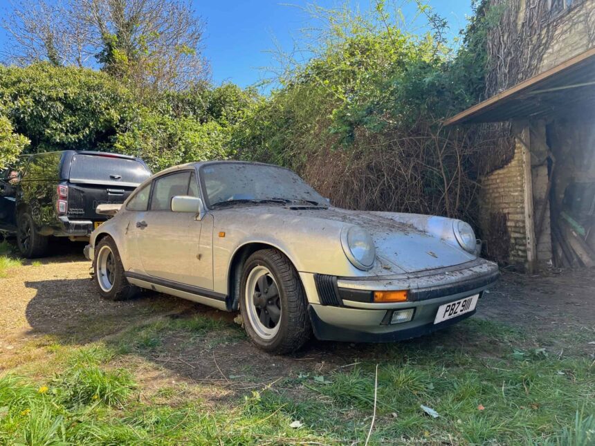 A dust-covered 1989 Porsche 911 Carrera Sport stored in a barn since 2011 has sold for £76,500 at auction, over triple its estimate, captivating collectors worldwide.