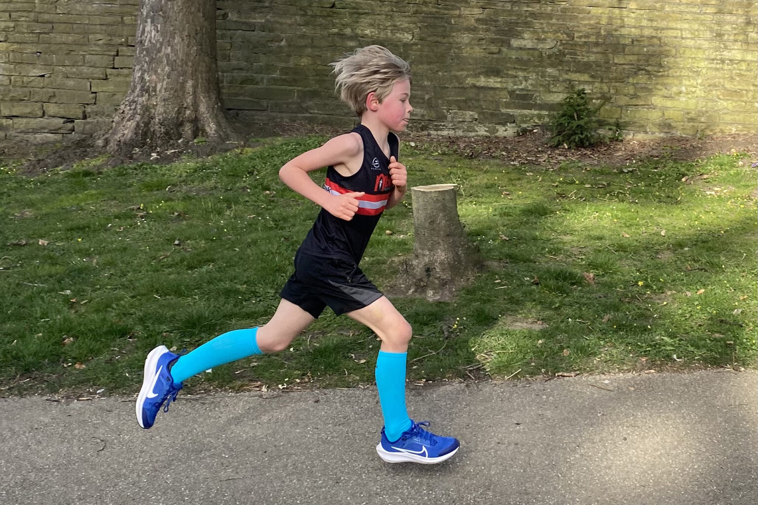 Seven-year-old Hugo Roth from Leeds broke the world record for his age by completing a 5K run in 20:59, inspired by the Brownlee Brothers and fuelled by boundless energy.