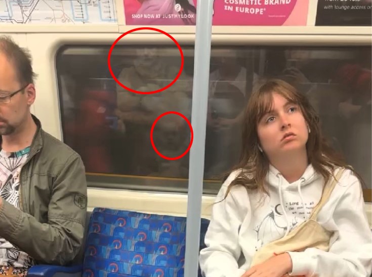 First-time Tube rider Elaaf Siddiqui captured a spooky reflection resembling a ghost on the Jubilee line - but it turned out to be a double image of a clown costume.