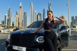 A Dubai student stunned TikTok with a viral video showing luxury cars like Lamborghinis and Bentleys lined up at her university, calling it a real-life car showroom.