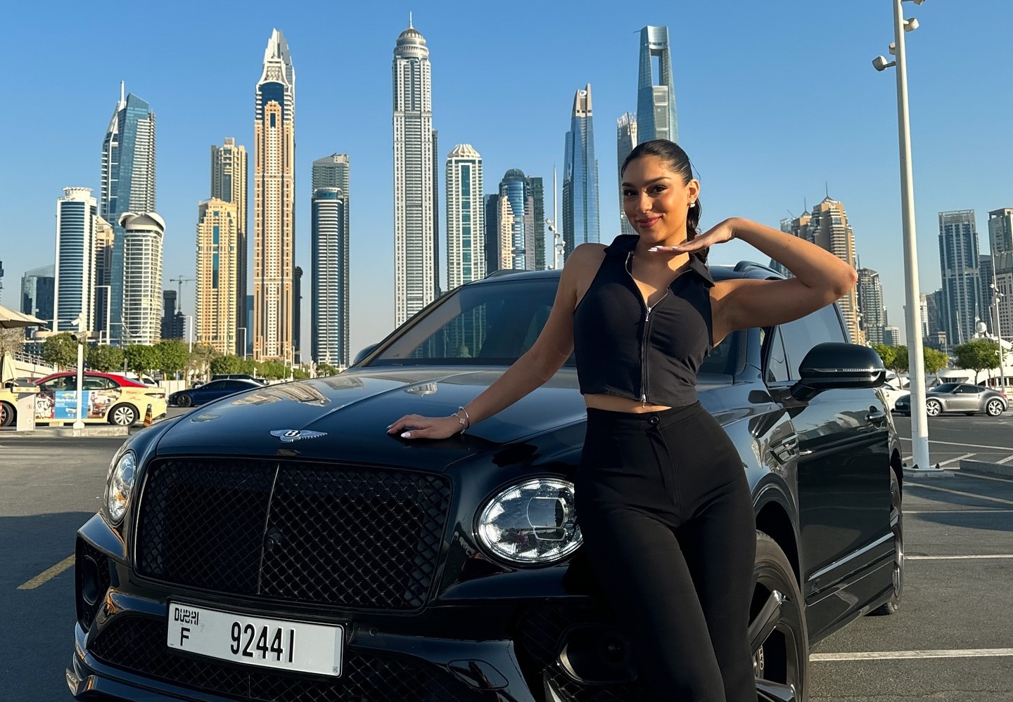 A Dubai student stunned TikTok with a viral video showing luxury cars like Lamborghinis and Bentleys lined up at her university, calling it a real-life car showroom.