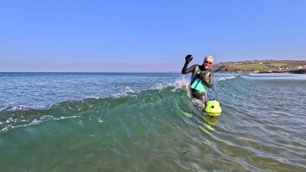 Swimmer Martina Morgan lost her Garmin watch at sea off Tenby - only for it to be found 150 miles away in Ireland three weeks later by a beach artist who traced her.