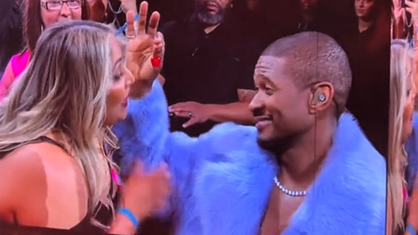 Usher accidentally tried to feed a cherry to a fan allergic to them during his O2 Arena show, sparking laughs as he joked and sang through the awkward moment.