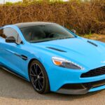 A V12 Aston Martin Vanquish featured on Top Gear and Jay Leno’s Garage, once driven by Bond and James May, is up for grabs in Toronto with bidding starting at £10,000.