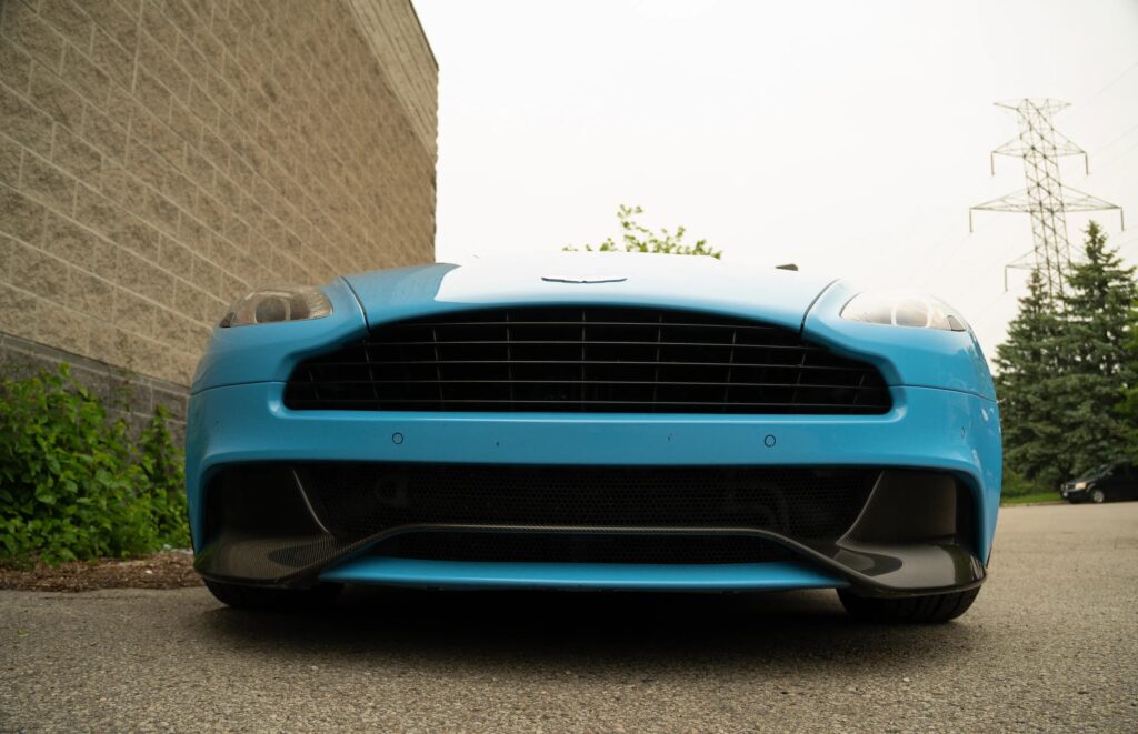 A V12 Aston Martin Vanquish featured on Top Gear and Jay Leno’s Garage, once driven by Bond and James May, is up for grabs in Toronto with bidding starting at £10,000.
