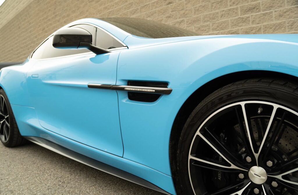 A V12 Aston Martin Vanquish featured on Top Gear and Jay Leno’s Garage, once driven by Bond and James May, is up for grabs in Toronto with bidding starting at £10,000.