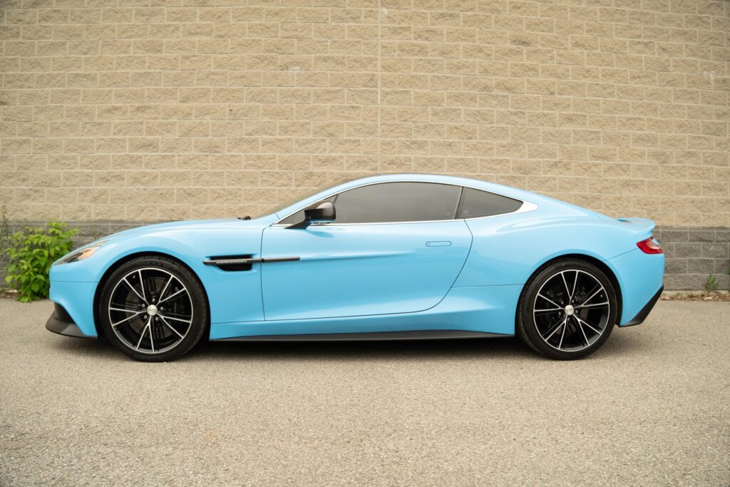 A V12 Aston Martin Vanquish featured on Top Gear and Jay Leno’s Garage, once driven by Bond and James May, is up for grabs in Toronto with bidding starting at £10,000.