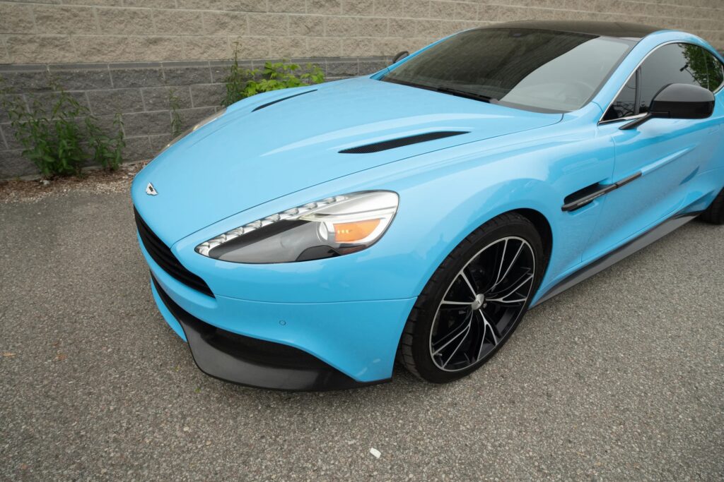 A V12 Aston Martin Vanquish featured on Top Gear and Jay Leno’s Garage, once driven by Bond and James May, is up for grabs in Toronto with bidding starting at £10,000.