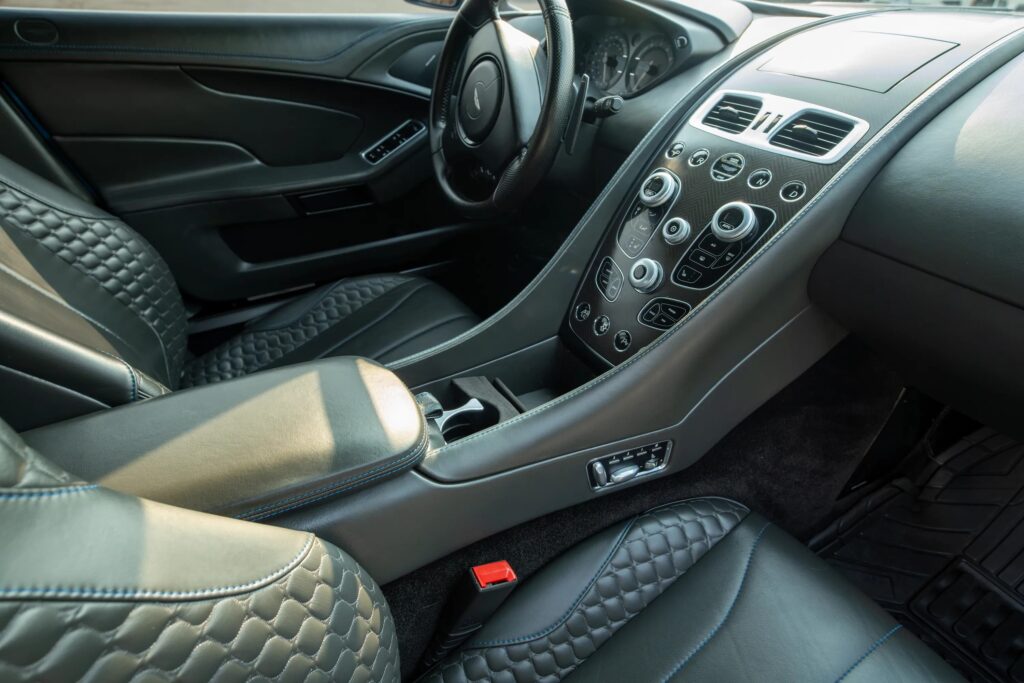A V12 Aston Martin Vanquish featured on Top Gear and Jay Leno’s Garage, once driven by Bond and James May, is up for grabs in Toronto with bidding starting at £10,000.