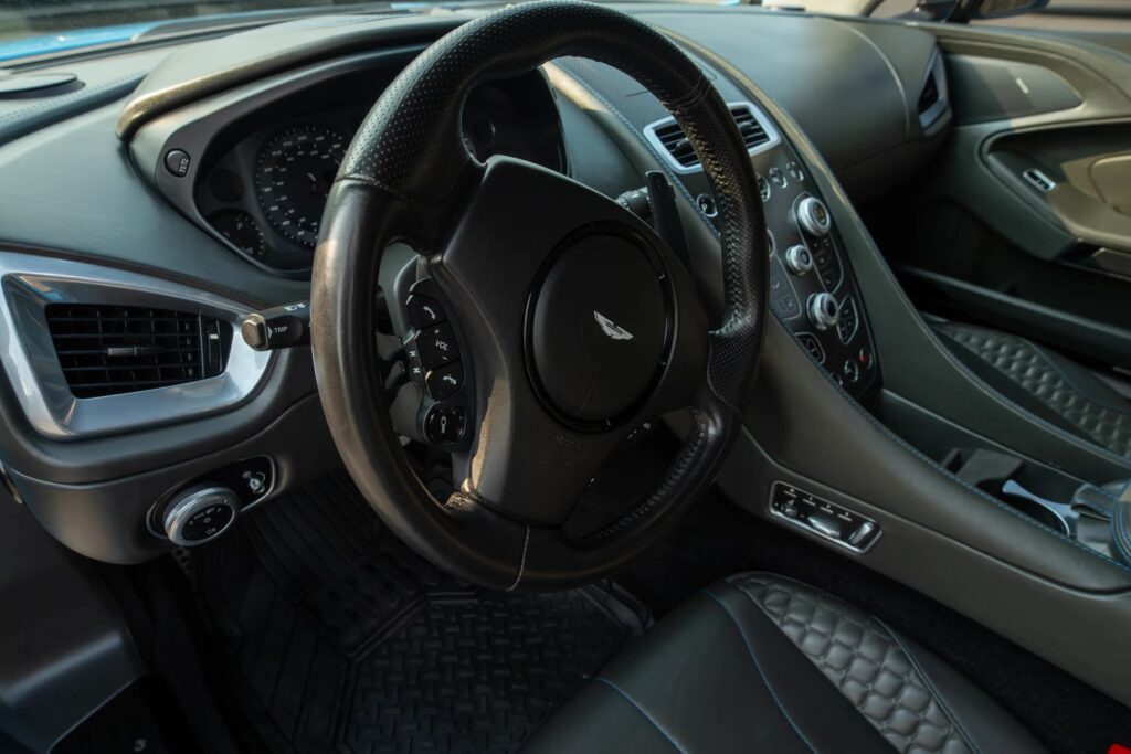 A V12 Aston Martin Vanquish featured on Top Gear and Jay Leno’s Garage, once driven by Bond and James May, is up for grabs in Toronto with bidding starting at £10,000.