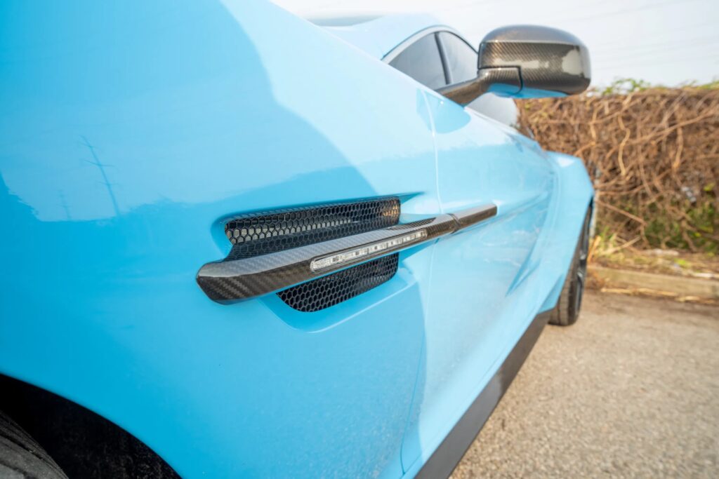 A V12 Aston Martin Vanquish featured on Top Gear and Jay Leno’s Garage, once driven by Bond and James May, is up for grabs in Toronto with bidding starting at £10,000.