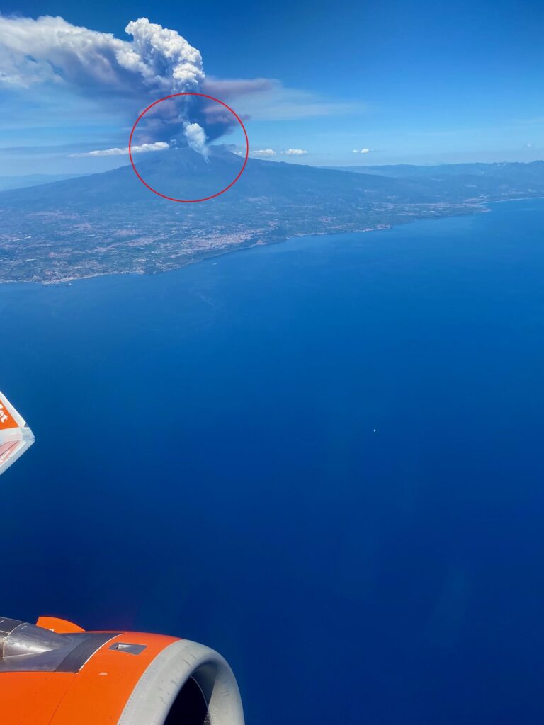 A British couple saw Mount Etna erupt from their plane just hours after racing up the volcano during a championship in Sicily, capturing a dramatic and rare sight.