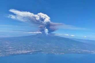 A British couple saw Mount Etna erupt from their plane just hours after racing up the volcano during a championship in Sicily, capturing a dramatic and rare sight.
