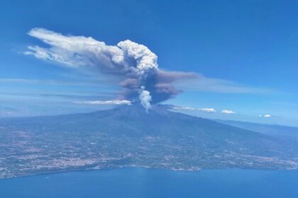 A British couple saw Mount Etna erupt from their plane just hours after racing up the volcano during a championship in Sicily, capturing a dramatic and rare sight.