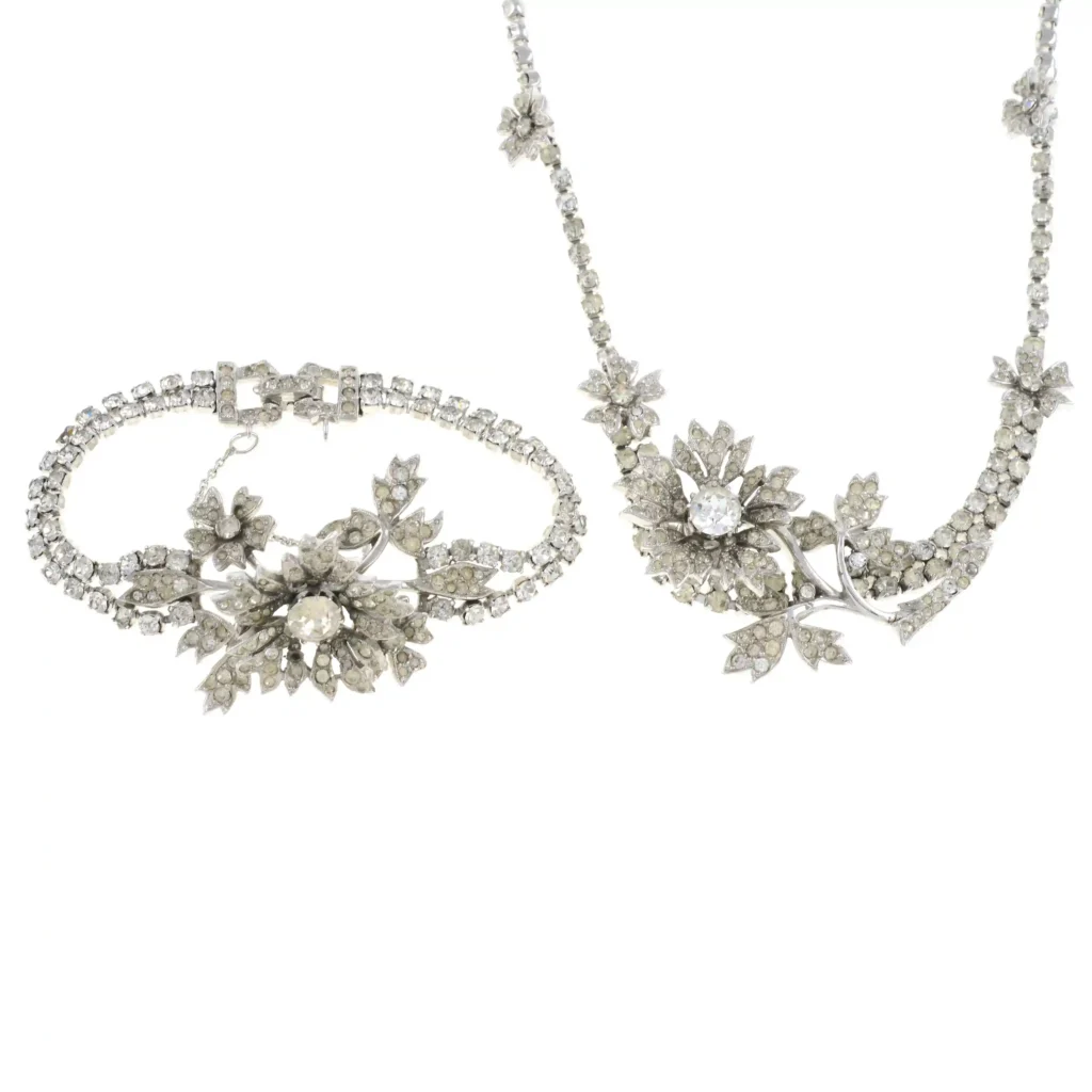 Three vintage Christian Dior heirlooms sell for over 10x estimate at auction – rare Mitchel Maer pieces spark bidding frenzy with musical brooch reaching £2,730.