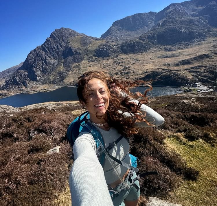 Hiker Grace Kelly discovered the breathtaking Cirque de Gavarnie in the French Pyrenees during a rainy trek, calling it a magical waterfall wonderland and her most unforgettable view.