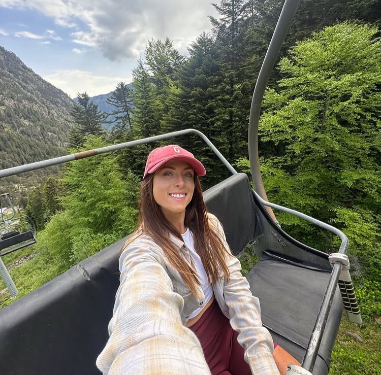 Hiker Grace Kelly discovered the breathtaking Cirque de Gavarnie in the French Pyrenees during a rainy trek, calling it a magical waterfall wonderland and her most unforgettable view.