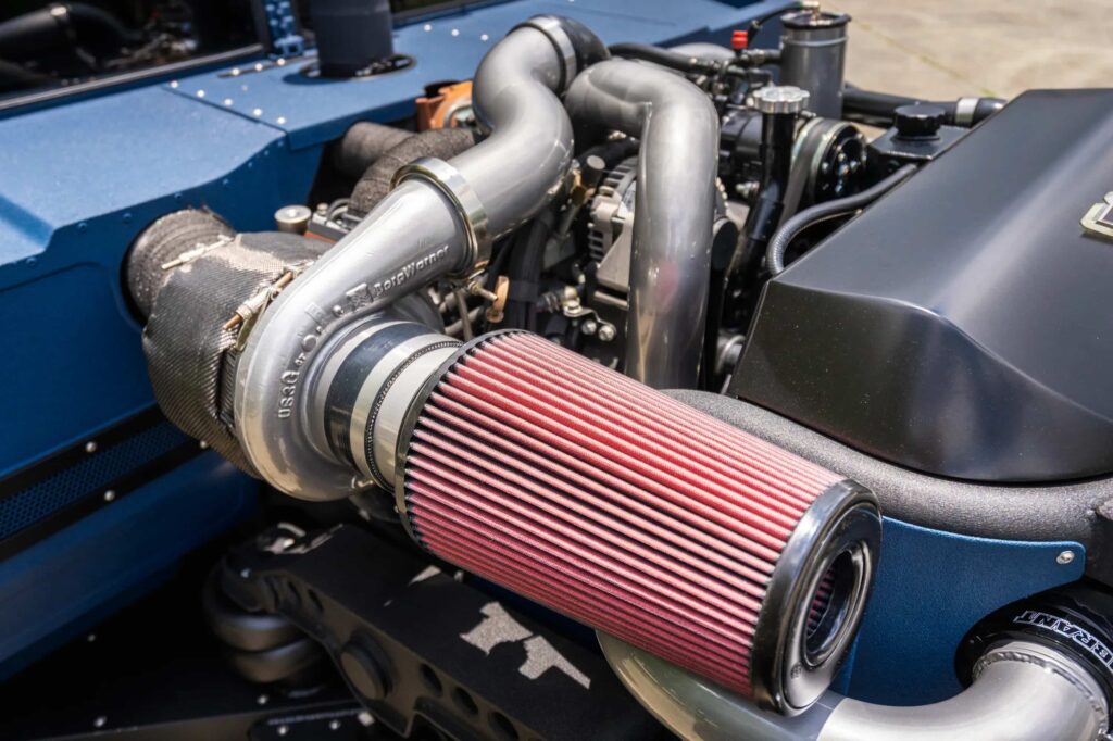 A custom 1987 AM General Humvee with 750hp, air suspension, and just 1,700 miles is turning heads at auction, blending rat rod style with extreme off-road performance.