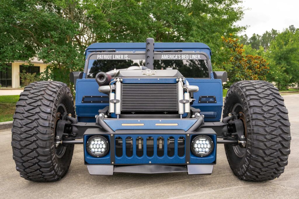 A custom 1987 AM General Humvee with 750hp, air suspension, and just 1,700 miles is turning heads at auction, blending rat rod style with extreme off-road performance.