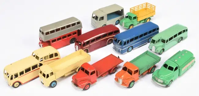 Over 600 rare Dinky Toys sold for £87,520 at auction, including a record-breaking Thunderbird 2 and Weetabix van, highlighting global demand for vintage collectibles.