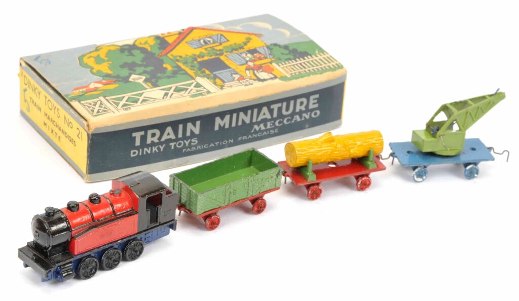 Over 600 rare Dinky Toys sold for £87,520 at auction, including a record-breaking Thunderbird 2 and Weetabix van, highlighting global demand for vintage collectibles.