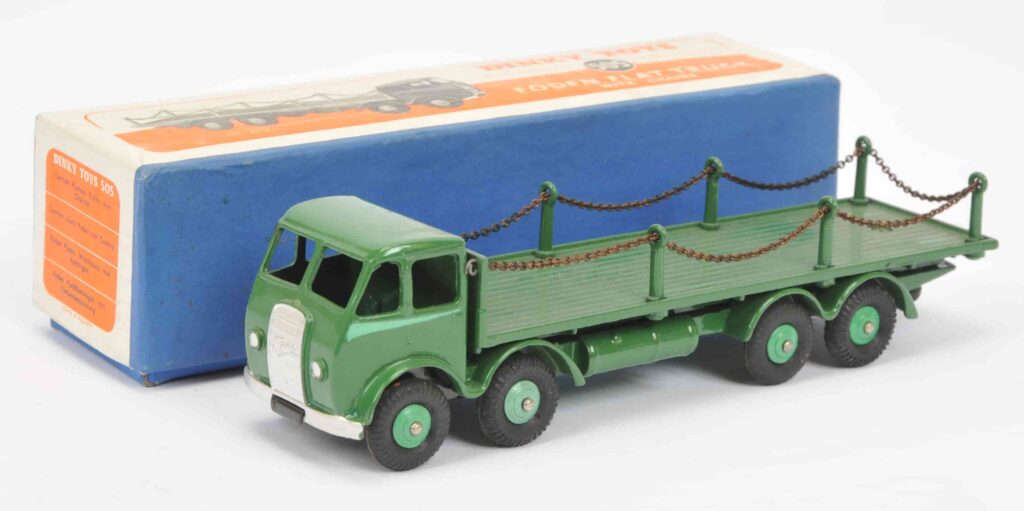 Over 600 rare Dinky Toys sold for £87,520 at auction, including a record-breaking Thunderbird 2 and Weetabix van, highlighting global demand for vintage collectibles.
