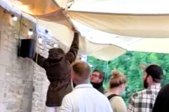 Jeremy Clarkson’s £40k pub umbrellas at The Farmer’s Dog backfired as rain pooled and poured onto decking, leaving staff scrambling and visitors amused by the mishap.