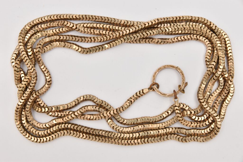 A woman’s forgotten jewellery collection hidden in a cupboard for 18 years stuns at auction, selling for £8,255 after being valued at just £1,000 by a second opinion.