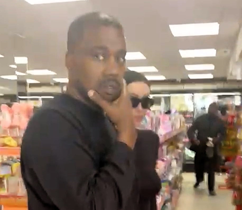 Kanye West and wife Bianca Censori were spotted shopping in a Magaluf tourist store, surprising locals as they browsed crisps and cheeky gifts during a six-week island stay.