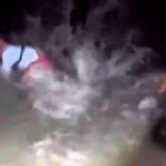 A man was hilariously "baptised" by a hammerhead shark after freeing it from a hook, getting knocked into the sea by its thrashing tail near Marco Island, Florida.