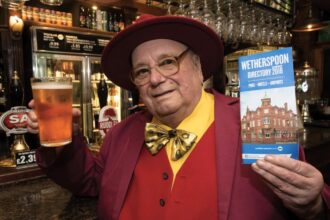 OMRLP leader Alan ‘Howling Laud’ Hope will celebrate his 83rd birthday at his local Wetherspoons in Fleet, marking 5,000 visits and 43 years of his eccentric party’s legacy.