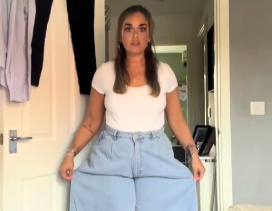 Mum left in stitches after £5 Vinted jeans turn out hilariously huge - TikTok clip of extra wide-leg denim sparks jokes about wind warnings and Willy Wonka.