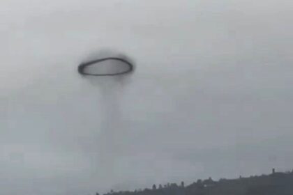 A mysterious black ring spotted in the sky over La Palma sparked UFO speculation, but experts say it was likely a vortex ring from fireworks or a small explosion.