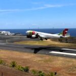 TAP Air Portugal jet lands on third attempt in windy Madeira as plane spotter captures dramatic footage - pilot praised after tense touchdown at tricky airport.