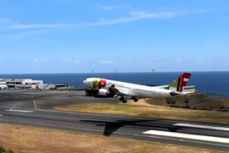 TAP Air Portugal jet lands on third attempt in windy Madeira as plane spotter captures dramatic footage - pilot praised after tense touchdown at tricky airport.