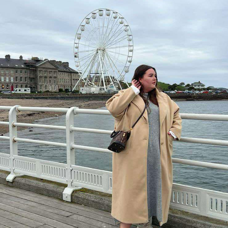 Plus-size traveller Brooke Ward hit back at trolls after sharing her flight experience, aiming to help others feel confident flying despite cruel comments about her size.