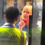 Radio DJ Sara Cox was hilariously delayed entry to a Soho bar for eating an apple - her co-host filmed the moment as the bouncer made her finish it before letting her in.