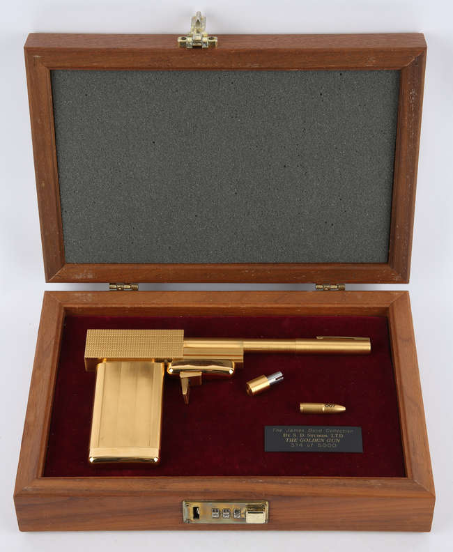 A rare 1965 Sean Connery James Bond doll sold for £6,500 at auction, alongside iconic 007 collectibles including watches, guns and spy gear in Surrey.