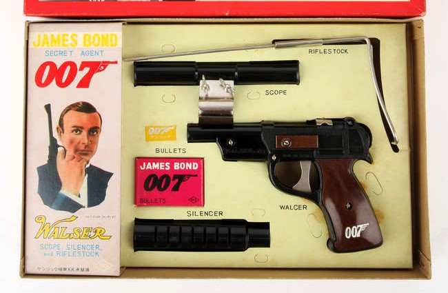 A rare 1965 Sean Connery James Bond doll sold for £6,500 at auction, alongside iconic 007 collectibles including watches, guns and spy gear in Surrey.
