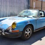 A rust-covered 1972 Porsche 911S Targa in rare Gemini blue has surfaced after decades in a barn and is now for sale in New York for nearly £50,000 as a restoration project.