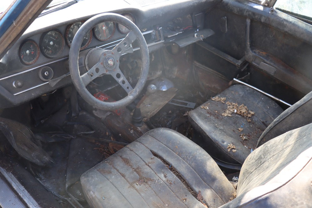 A rust-covered 1972 Porsche 911S Targa in rare Gemini blue has surfaced after decades in a barn and is now for sale in New York for nearly £50,000 as a restoration project.