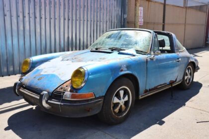 A rust-covered 1972 Porsche 911S Targa in rare Gemini blue has surfaced after decades in a barn and is now for sale in New York for nearly £50,000 as a restoration project.