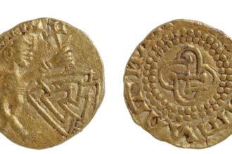 A rare Anglo-Saxon gold coin dating back to AD640-660 has been unearthed in Norfolk, blending Christian and pagan symbols in what experts call a major archaeological find.