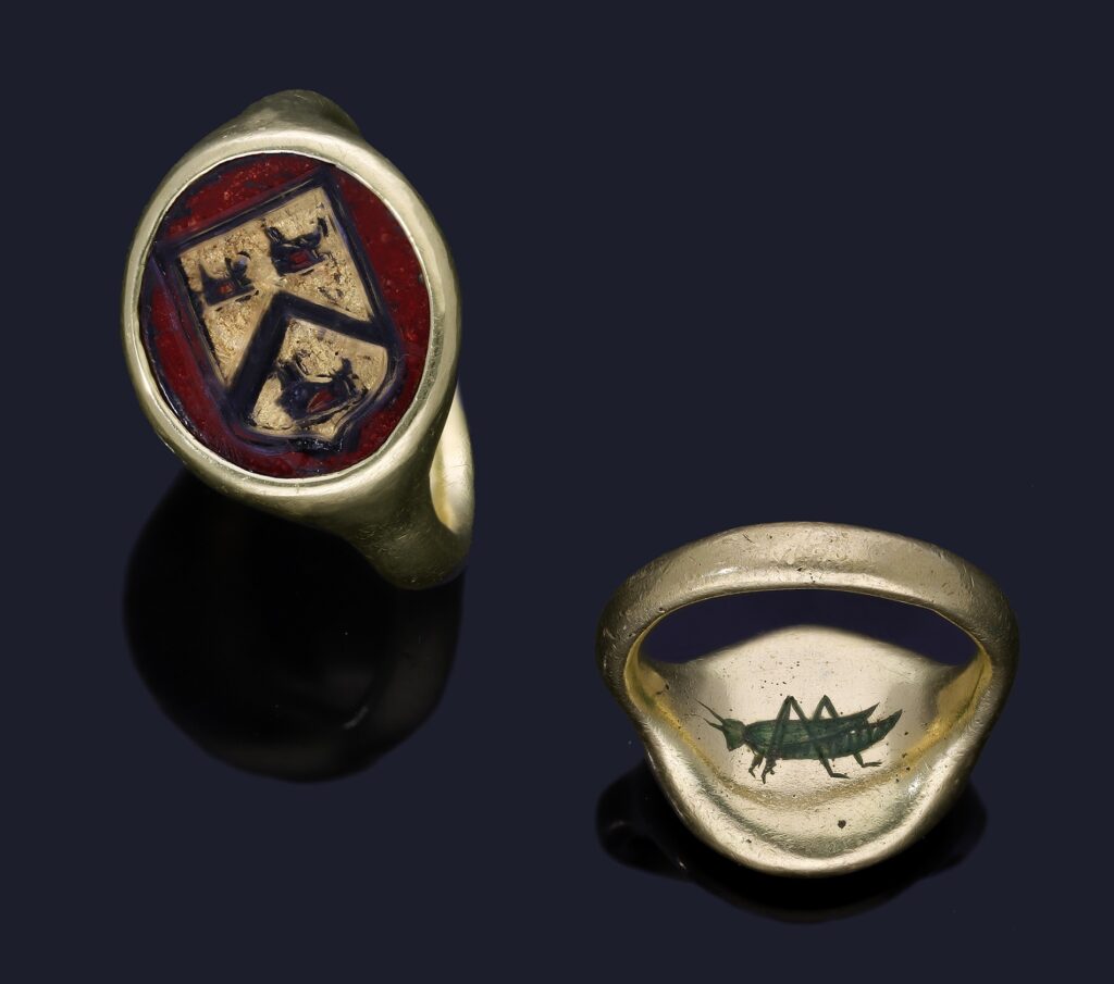 A rare Tudor ring gifted by financier Sir Thomas Gresham sold for £42,000, nearly five times its estimate, featuring a hidden grasshopper crest tied to royal loyalty.