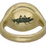A rare Tudor ring gifted by financier Sir Thomas Gresham sold for £42,000, nearly five times its estimate, featuring a hidden grasshopper crest tied to royal loyalty.